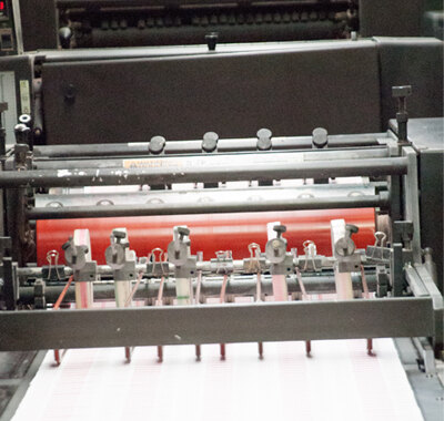 Continuous forms running through a press